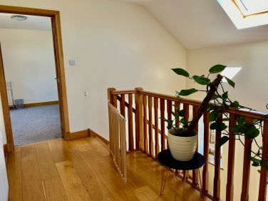 Landing area to the bedroom with the twin divan beds, stairgates can be provided on request