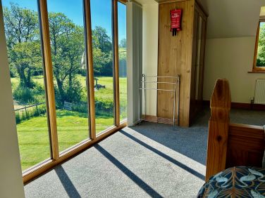 The view from the bed in the main bedroom