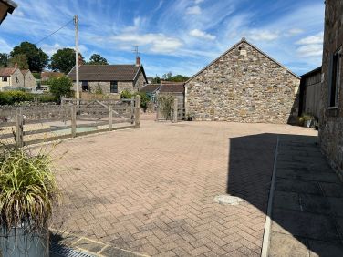 The parking area at Leat Cottage