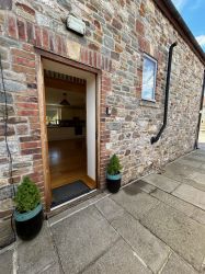 Rear doorway with level access from the parking area