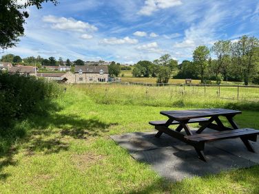 View of Leat Cottage from the picnic bench in the guests field area