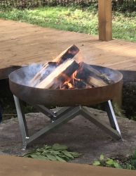 Fire basket and new decking by the cabin