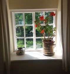 Swan bedroom view into garden