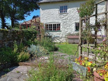 Rear of cottage; kitchen garden