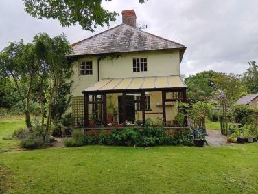 Side view of conservatory and front entrance