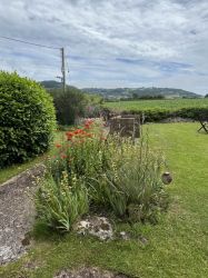 Enclosed back garden with views to Seaton beach.