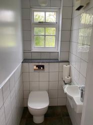 2022 old shower room converted to 2 rooms - new toilet with wash handbasin