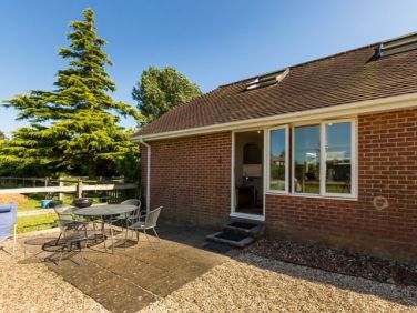 Main entrance and terrace from paddock