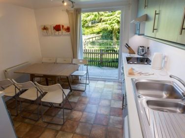 Kitchen and morning sun from deck