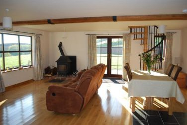 Large lounge with log burner