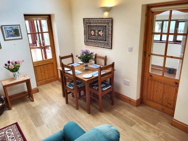 Dining area leading to conservatory