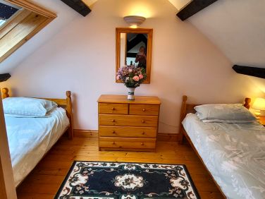 Upstairs twin bedroom