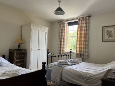 Bedroom 4: with double bed and single bed and a hand-basin