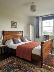 Bedroom 3: with king size bed and view to woods