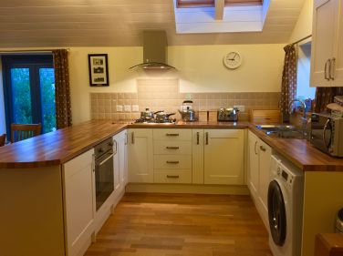 Fully equipped kitchen with cooker, fridge-freezer, washing machine, dishwasher etc