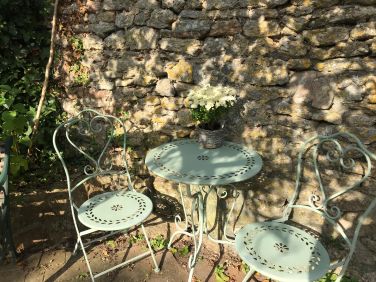 A lovely sunspot to sit and enjoy a drink.