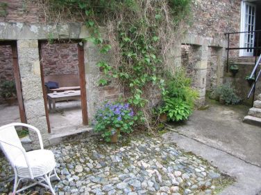 Spry's private part-covered courtyard