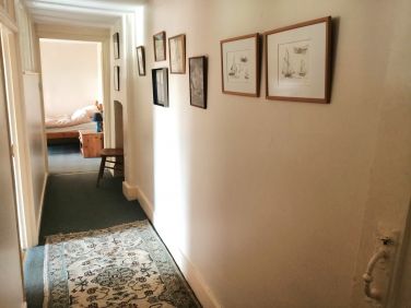 Passage in the Coach House passing two bedrooms