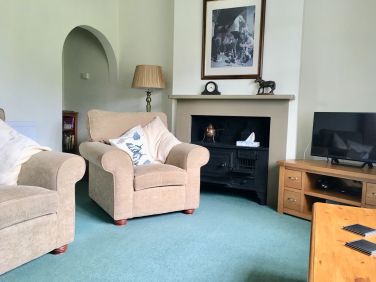 Lounge. Furnishings vary in each cottage