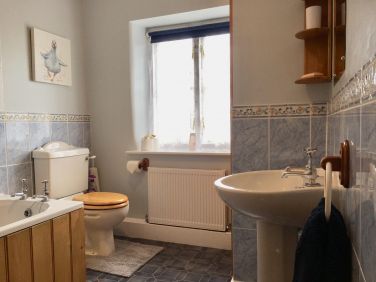 Bathroom with bath/overshower