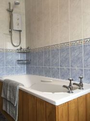 Bathroom with bath/overshower