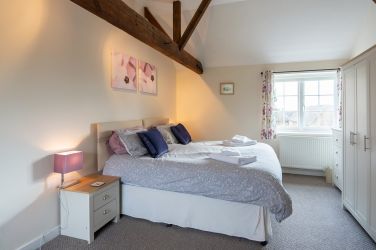 Bedroom, super king bed , ensuite bathroom. very spacious bedroom with full length mirror and armcha