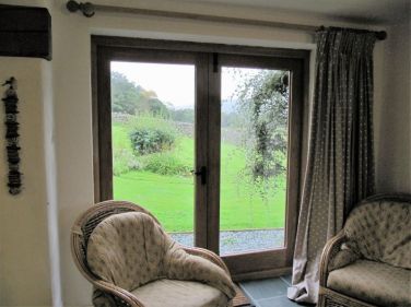 French windows from Kitchen into side garden