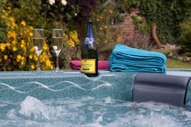 Relax in the 6 seater hot tub