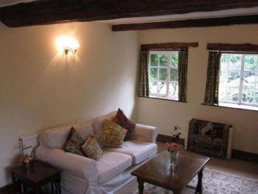 Lounge TV room (has wood-burning stove)