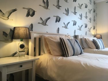 Twin or king size double with en suite shower room