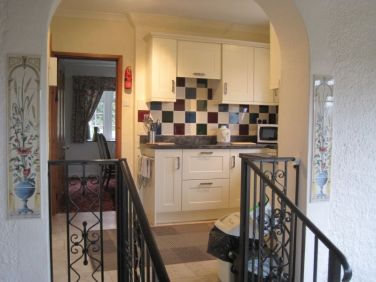 Kitchen looking through to dining room