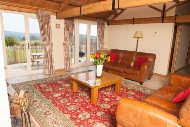 Lounge with views over Lockerley church and countryside
