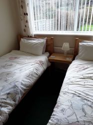 Twin room with full size single beds suitable for adults