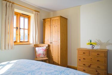 View of wardrobe in kingsize bedroom, Fallow Cottage, Hucklesbrook Farm, New Forest Holiday Cottages