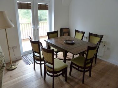 The dining area, opening out to balcony