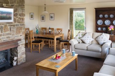 Huge lounge / dining area with panoramic window & views.