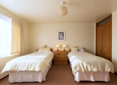 Built in wardrobes, additional cot can be supplied.