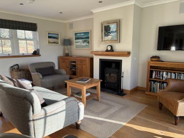 Bright and sunny and warm and cosy in the winter.