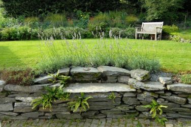 The slate seat opposite the front door. Nice spot for a leisurly coffee!