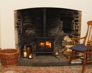 The cosy wood burner in the middle sitting room.