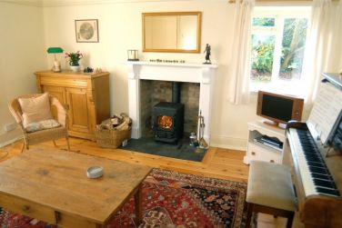 The family room has a 42in TV plus board games, piano & guitars