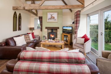Living room with wood burner, wifi and large TV