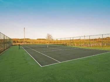 Championship size tennis court
