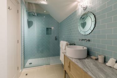 Two stylish luxurious en-suite shower rooms
