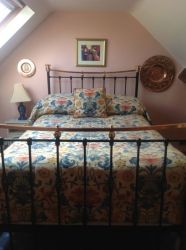 Smaller double bedroom with 3/4 size bed