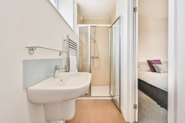 Ensuite in Bedroom 6.  Power shower and downstairs toilet.  Ideal for those with limited mobility.
