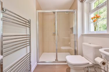 Bedroom 1 ensuite power shower and toilet.  Super king zip and link beds so can be twins instead.