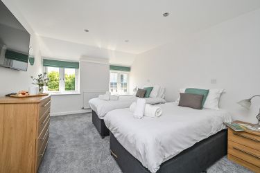 Bedroom 3 Super King Size beds.  Zip and link so can be twins if required.  Large flat TV screen.