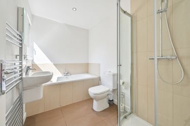 Family bathroom for bedrooms 3 and 4.  Villeroy and Boch bath and power shower.