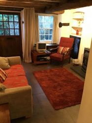 Cosy lounge with beamed ceiling